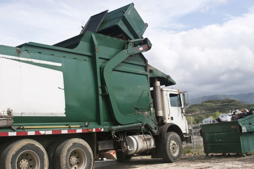 Recyclable materials separated into boxes at a clearance job